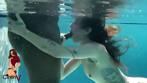 Hot tattooed babe with a mouth is getting fucked under the waves