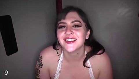 A brunette with big boobs is being fucked by two black cocks