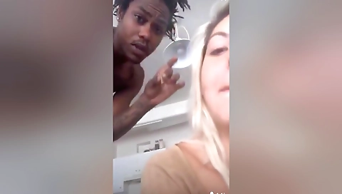 Tattooed blonde girl is sucking a dick in her pussy