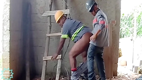 Black dude fucks a blonde girl in an outdoor setting