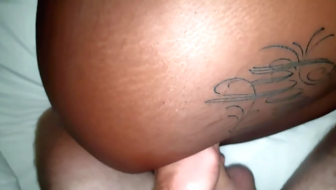 Black tattooed chick with a huge ass on a huge cock
