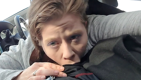 Brunette in a deepthroat is in a car with a big dick